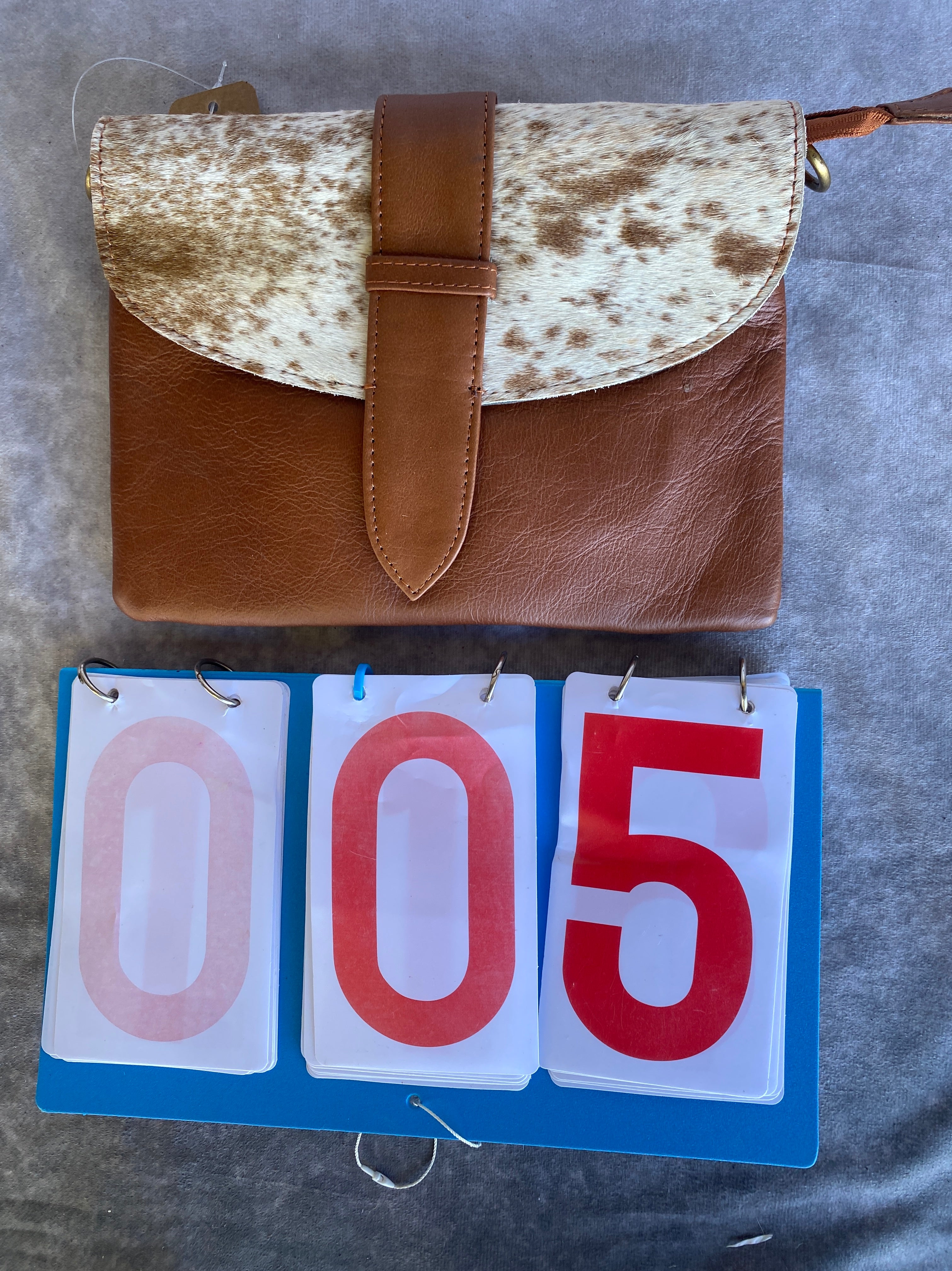 Cowhide Strap Clutch Bag