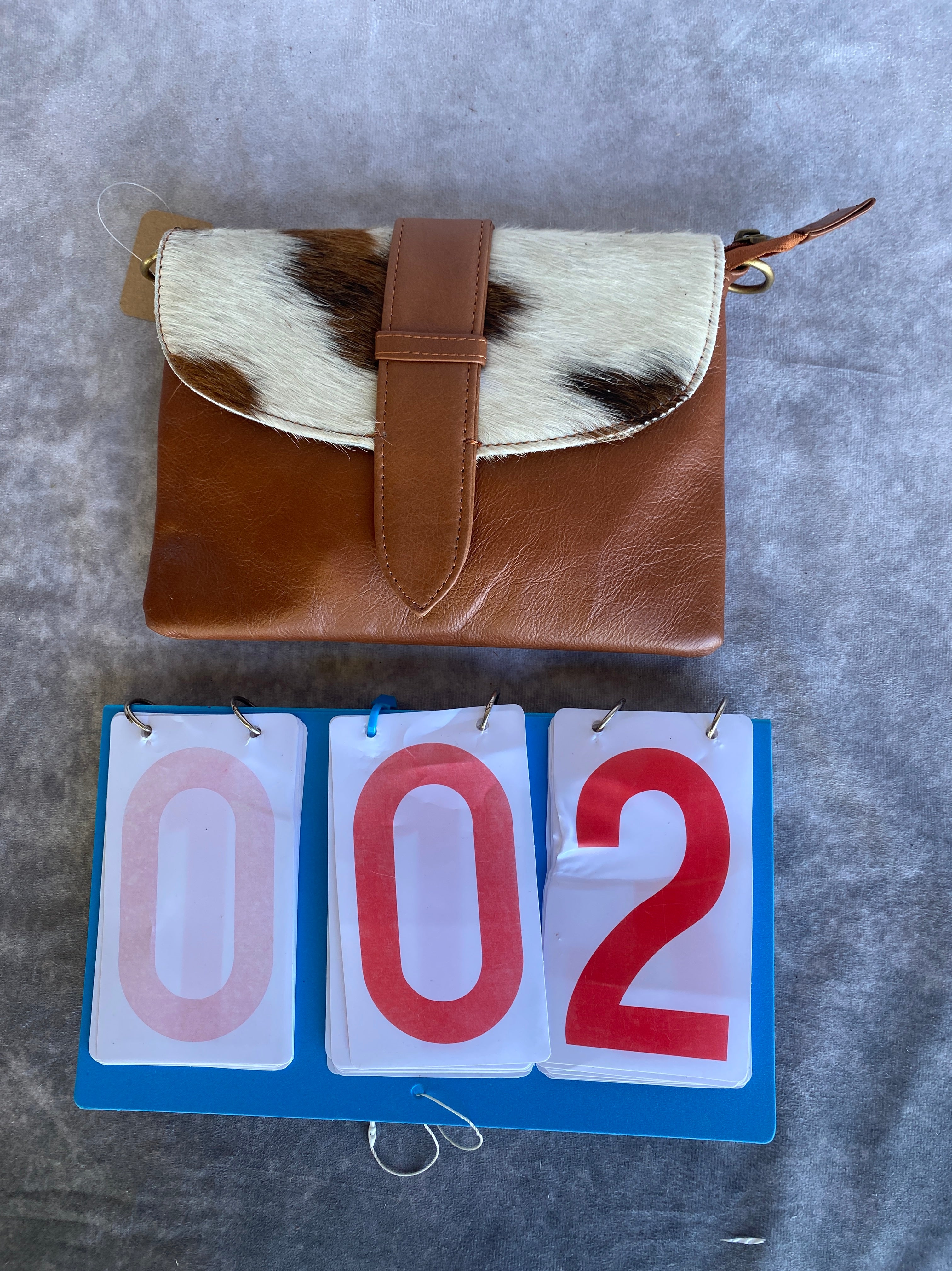 Cowhide Strap Clutch Bag