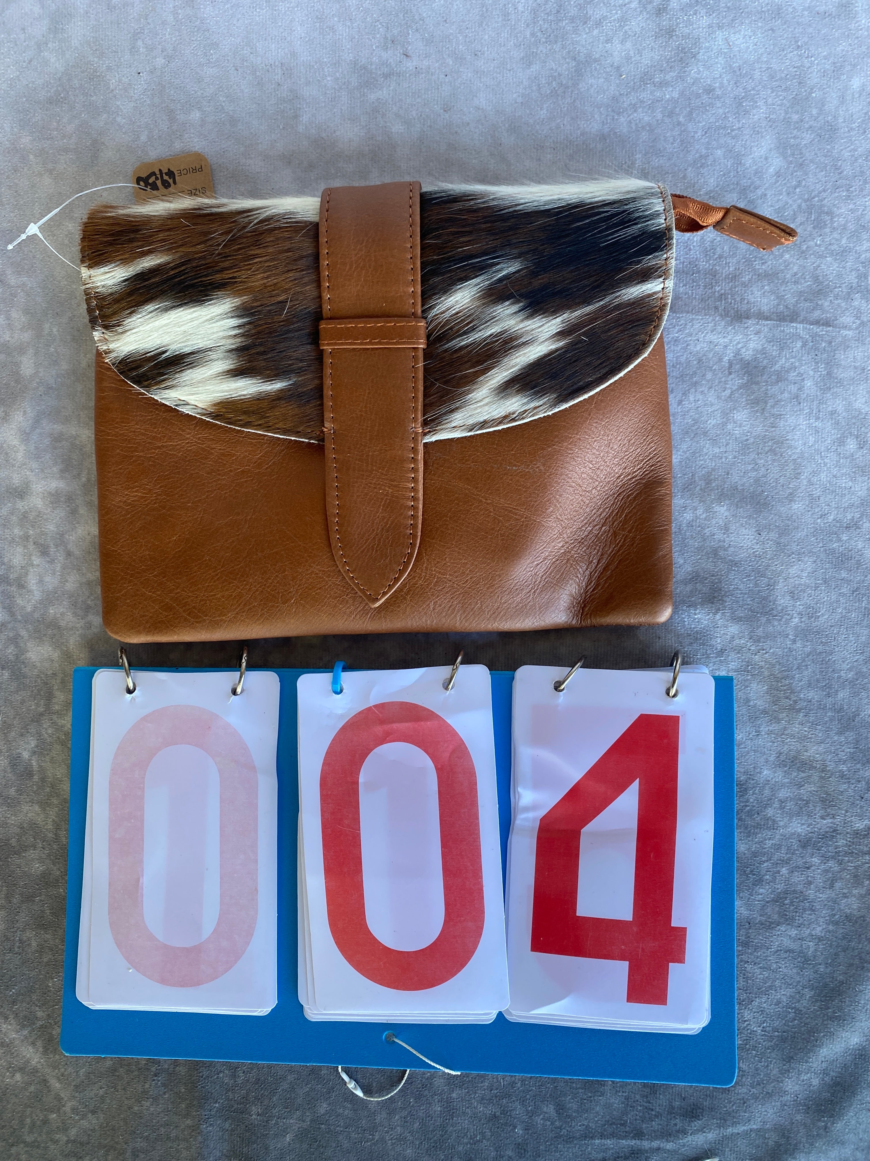 Cowhide Strap Clutch Bag