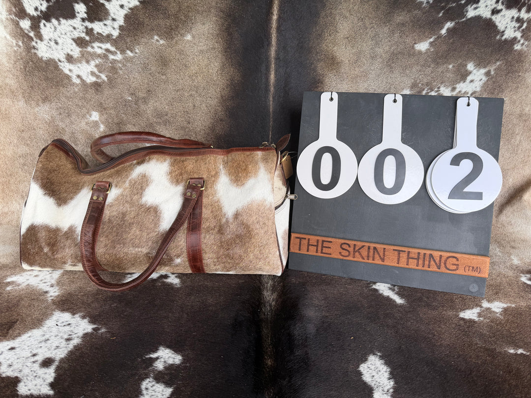 Cowhide Duffel Bag - Claudia