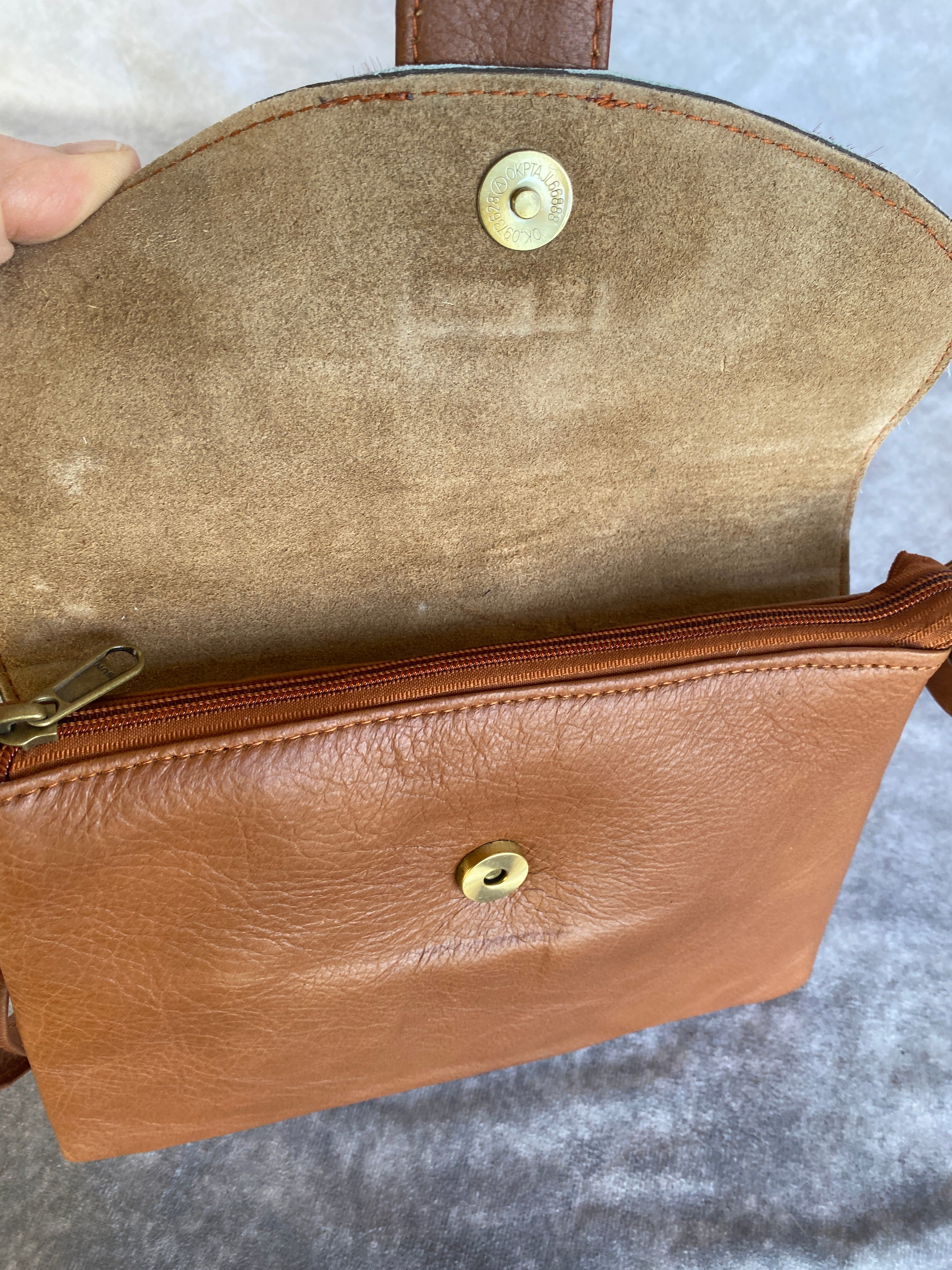 Cowhide Strap Clutch Bag