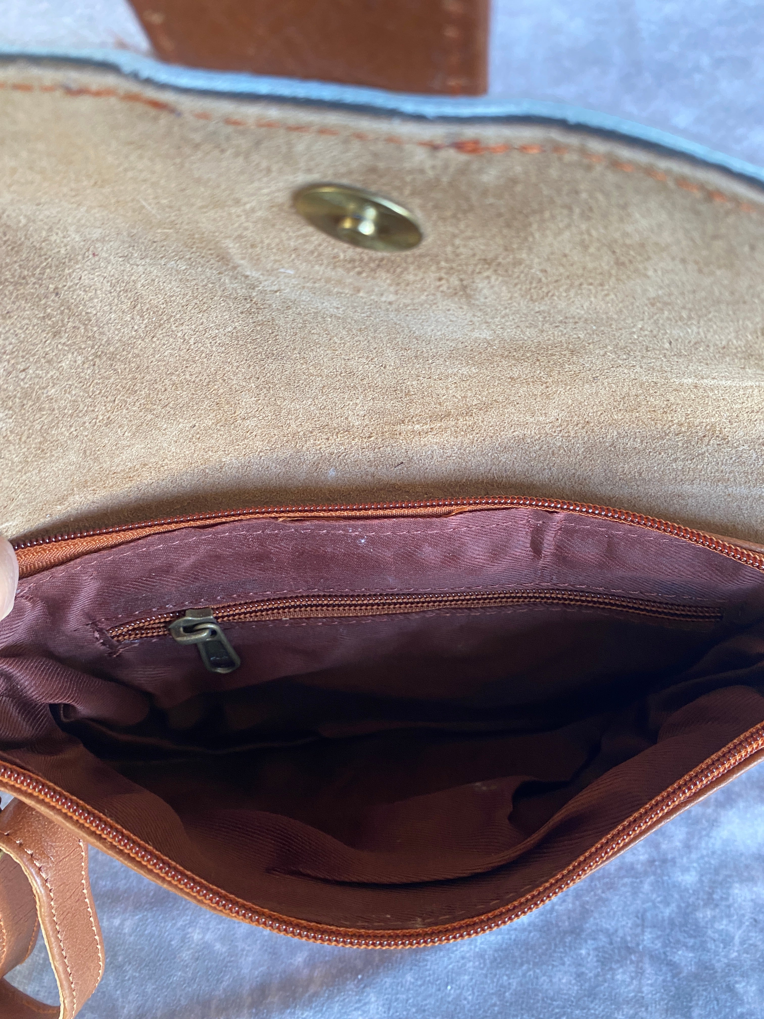 Cowhide Strap Clutch Bag