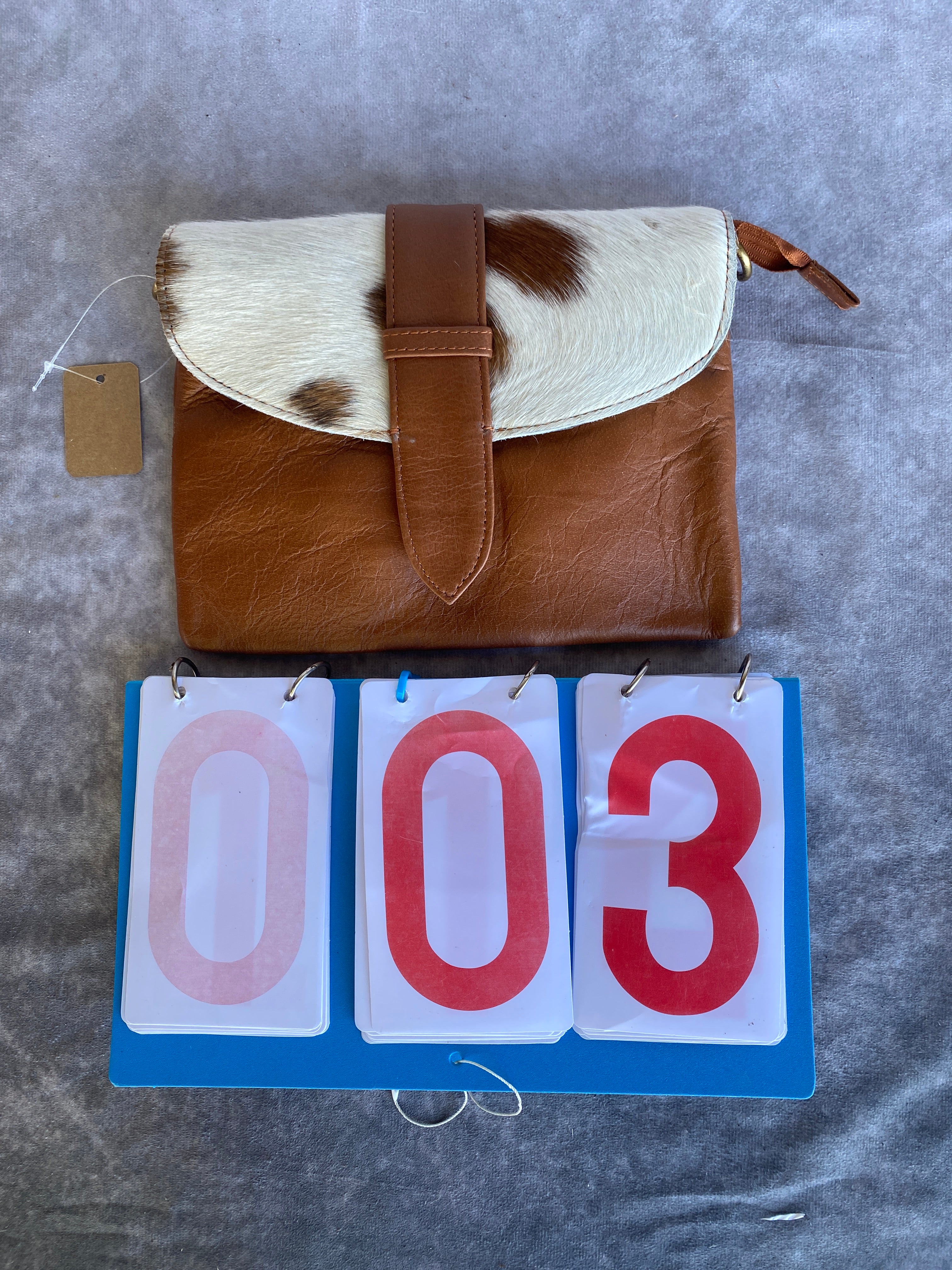 Cowhide Strap Clutch Bag