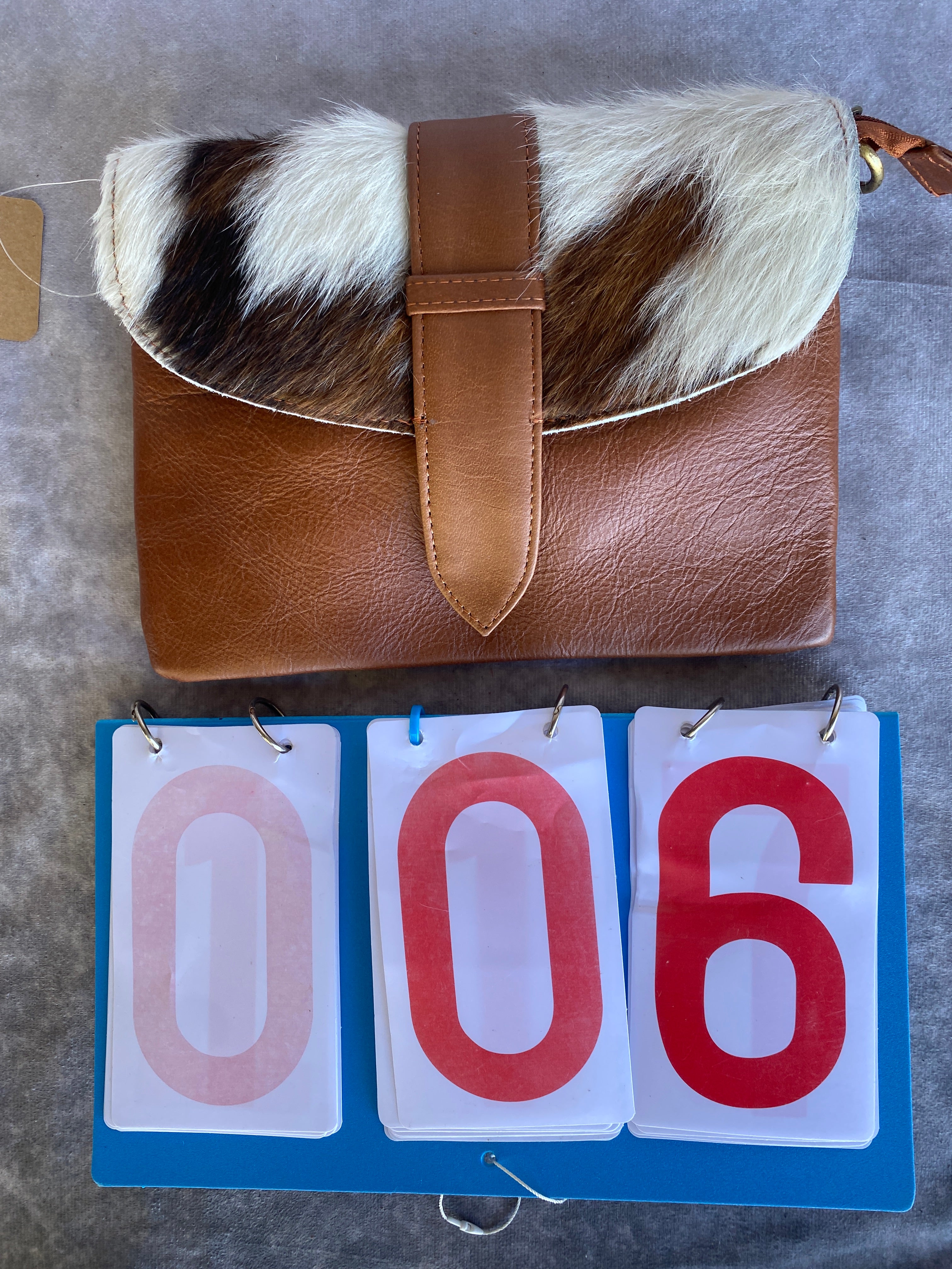 Cowhide Strap Clutch Bag