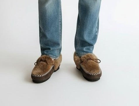 The Skin Thing brown kangaroo skin moccasins with wool lining and rubber sole. Handstitched detail.